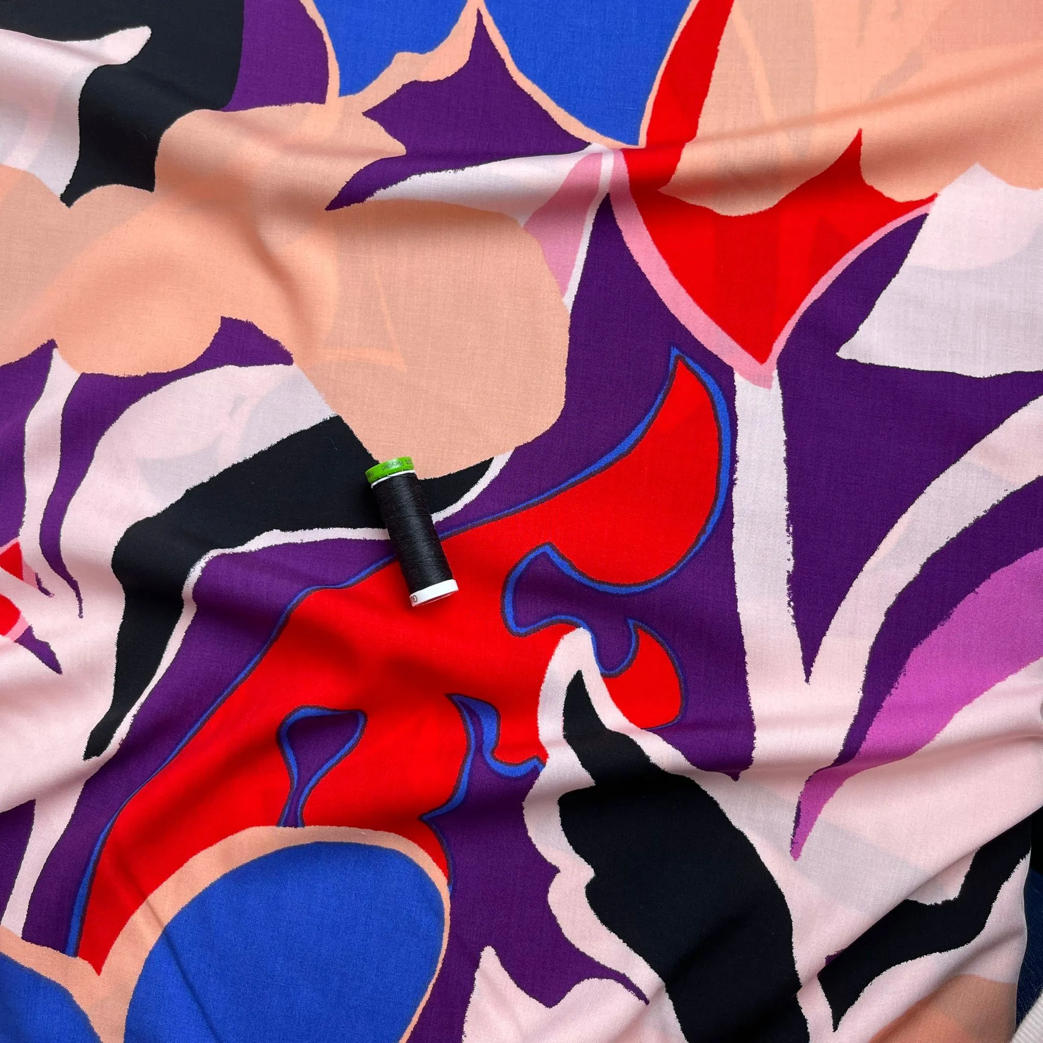 Bold Abstract Blooms on Purple Viscose Fabric